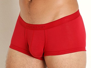 Model in banksia red CockSox Natural Origins Enhancer Pouch Trunk