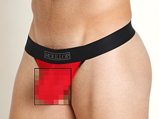 Model in red Mckillop Hoist Bulge Ultra Stretch Mesh Pouch 2.0