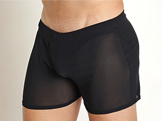 Model in black Mckillop Shade Ultra Stretch Mesh Shorts