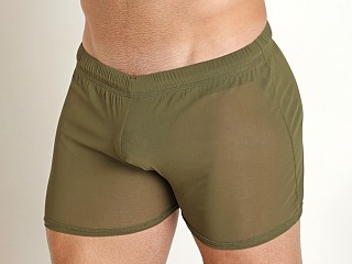 Model in army Mckillop Shade Ultra Stretch Mesh Shorts