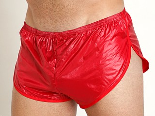 Model in red Mckillop Ripstop Running Shorts