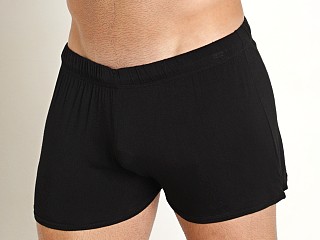 Model in black Mckillop Shade Whisper Shorts