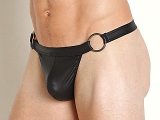 Model in black Manstore Nightclub Ring Hip Thong