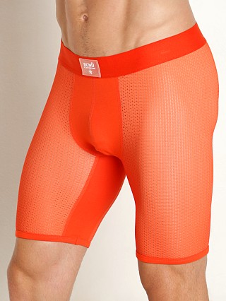 Model in orange BCNU Air Flex Sheer Mesh Compression Short