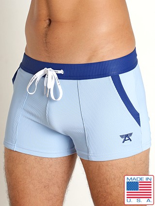 Model in sky/navy LASC FlexRib Swim Trunk Sky