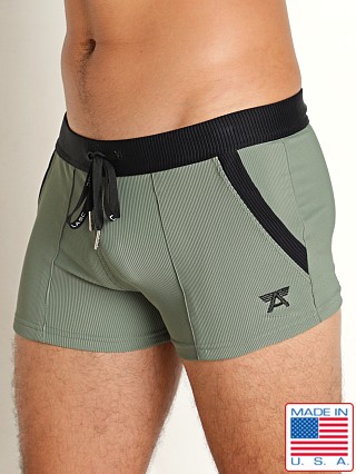 Model in sage/black LASC FlexRib Swim Trunk Sage