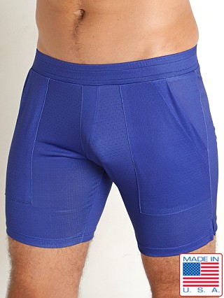 Model in marine LASC Perforated Jersey 6" Shorts